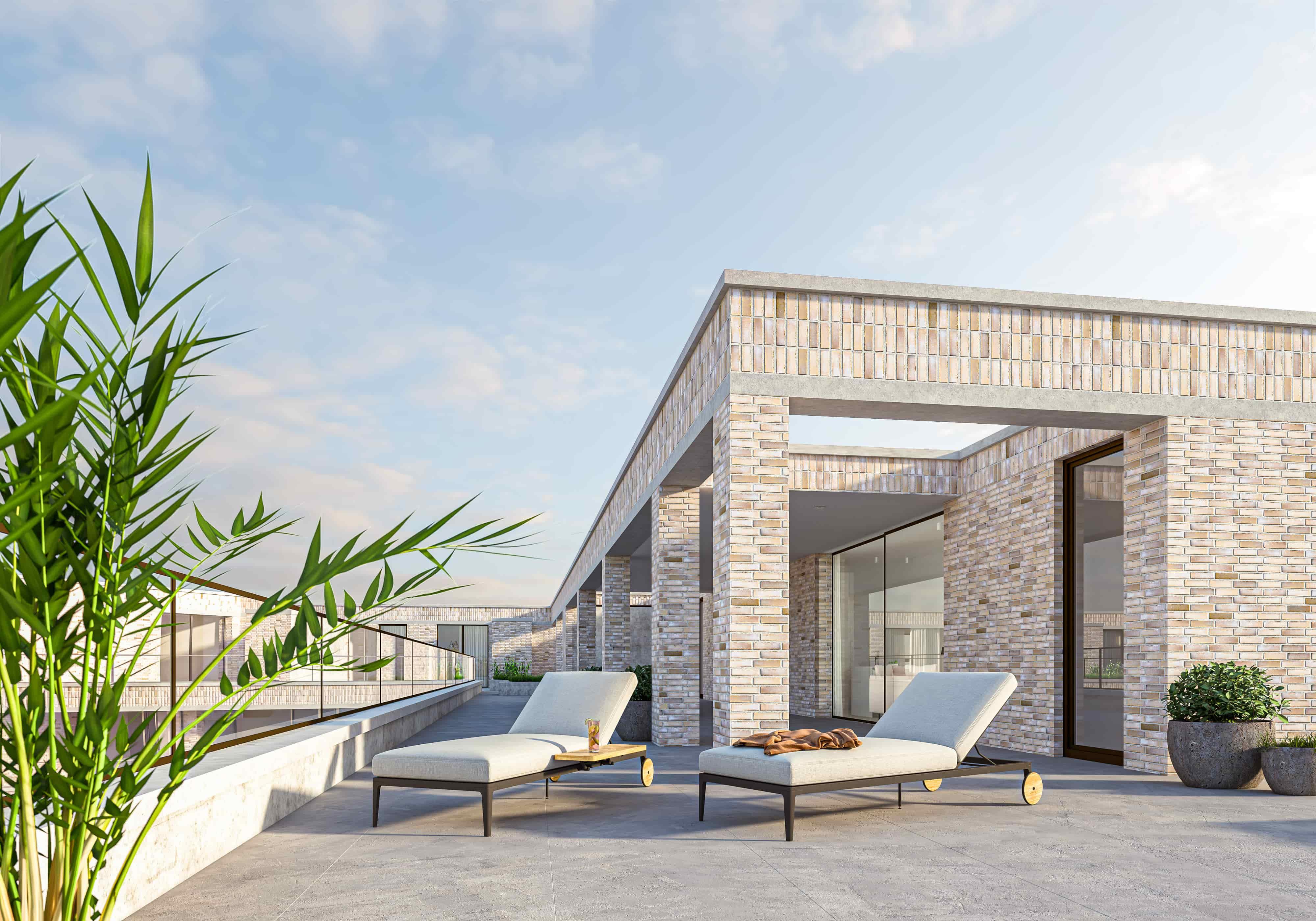 Dakterras met ligstoelen appartement Eymard